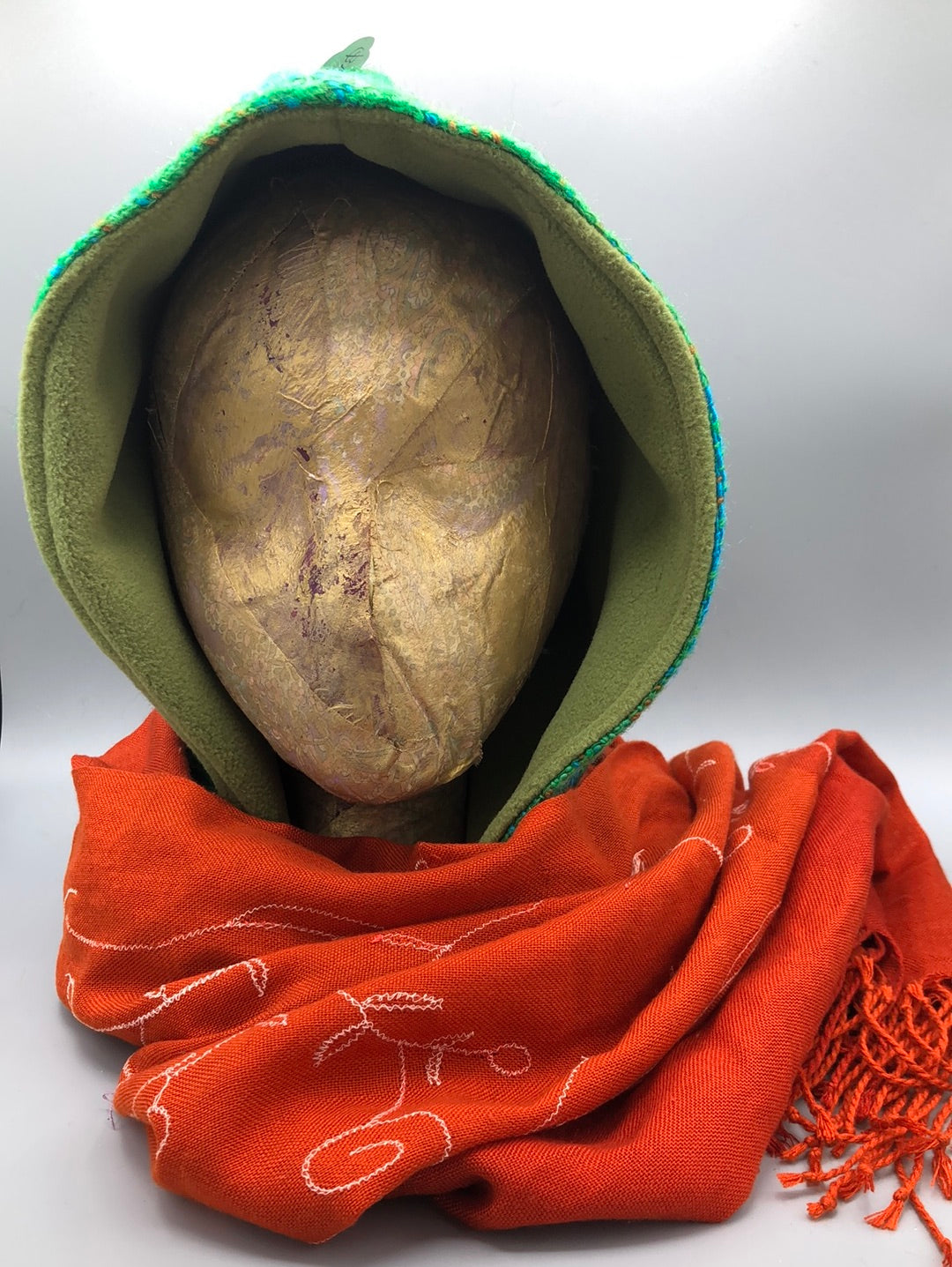 Green  Woven Hood with Sage Green Fleece Liner and deep orange embroidered Scarf